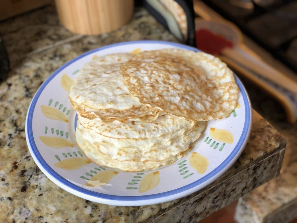 Stack of low carb tortillas on a plate