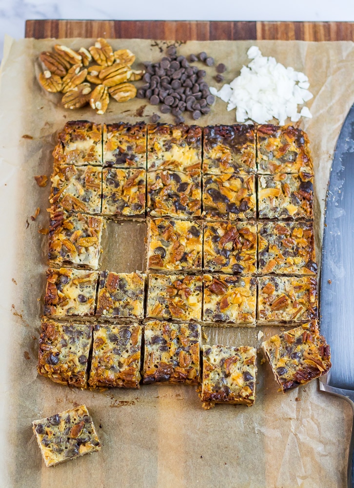 Keto Magic Bars on cutting board with knife